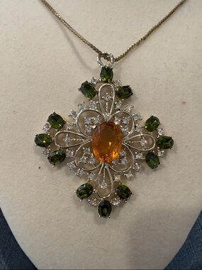 Women's Silver Pendant Necklace with Amber Center and Green Gem Accents